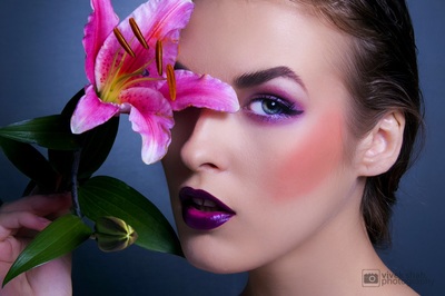 Model with  wild lily flower