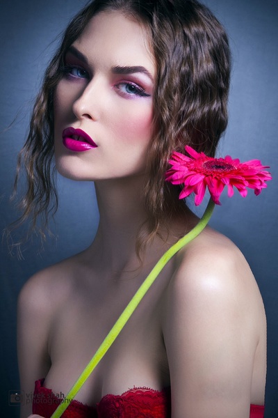 Beauty shot of Model with chrysanthemum flower