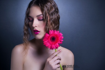 Model with chrysanthemum flower